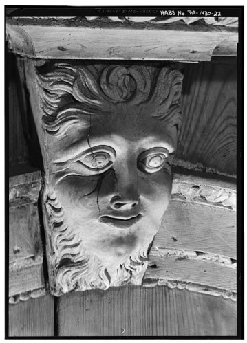 Detail of carved wooden mask with paint removed on tabernacle frame in the Central Hall of Independence Hall.