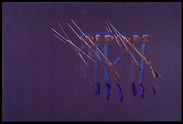 United States Marines marching to the left holding rifles with bayonets.