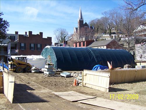 HPTC Day Labor Craftsmen laying stonework for the HAFE Park west arsenal foundation stabilization, Harpers Ferry Lower Town, February 17, 2009.