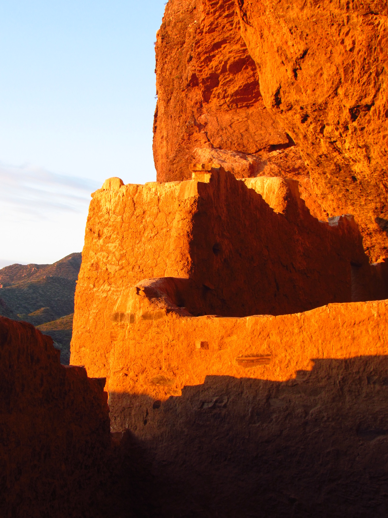 Orange Upper Cliff Dwelling walls during sunrise