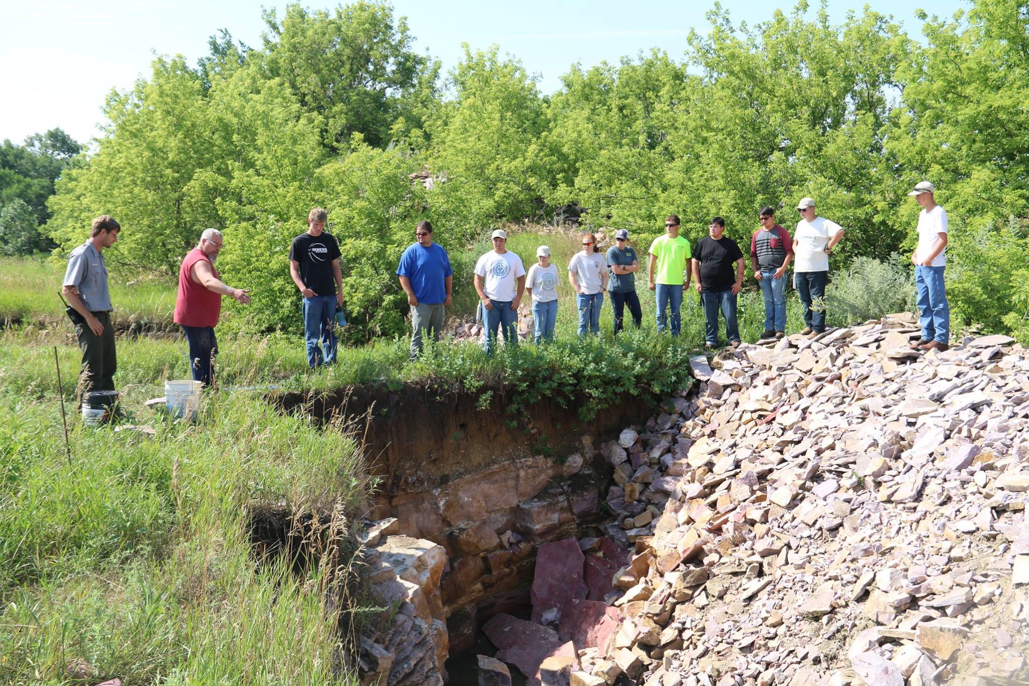 Quarrier and carver Travis Erickson talking about quarrying to youth. 