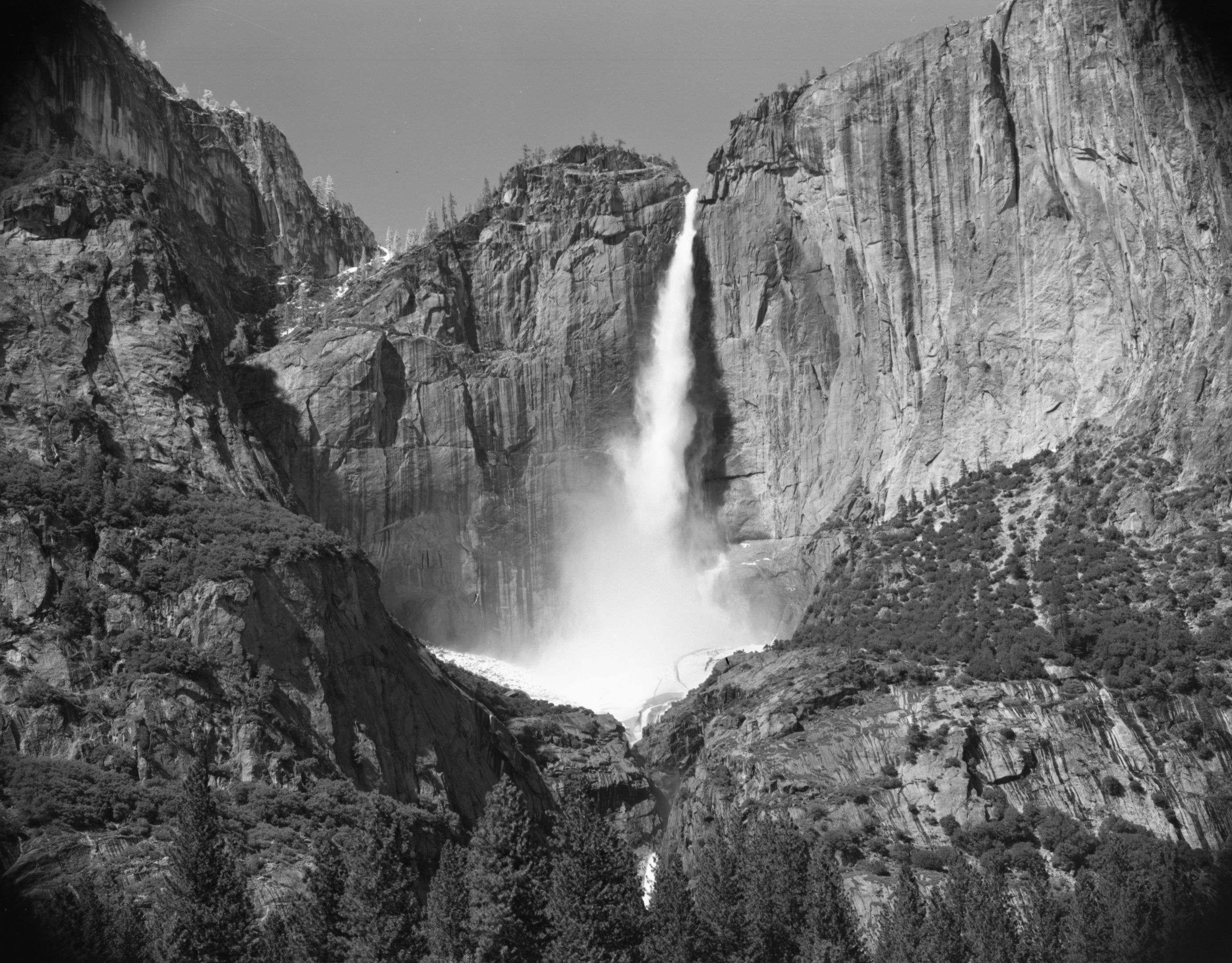 Yosemite Falls: Upper fall from road side west of Chapel. Record of snow cone demise.