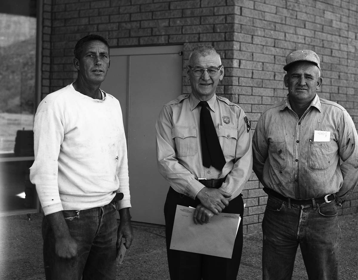 Assistant Superintendent Charles Humberger standing with Incentive Award recipients Ray Gifford and Earl Mansor.
