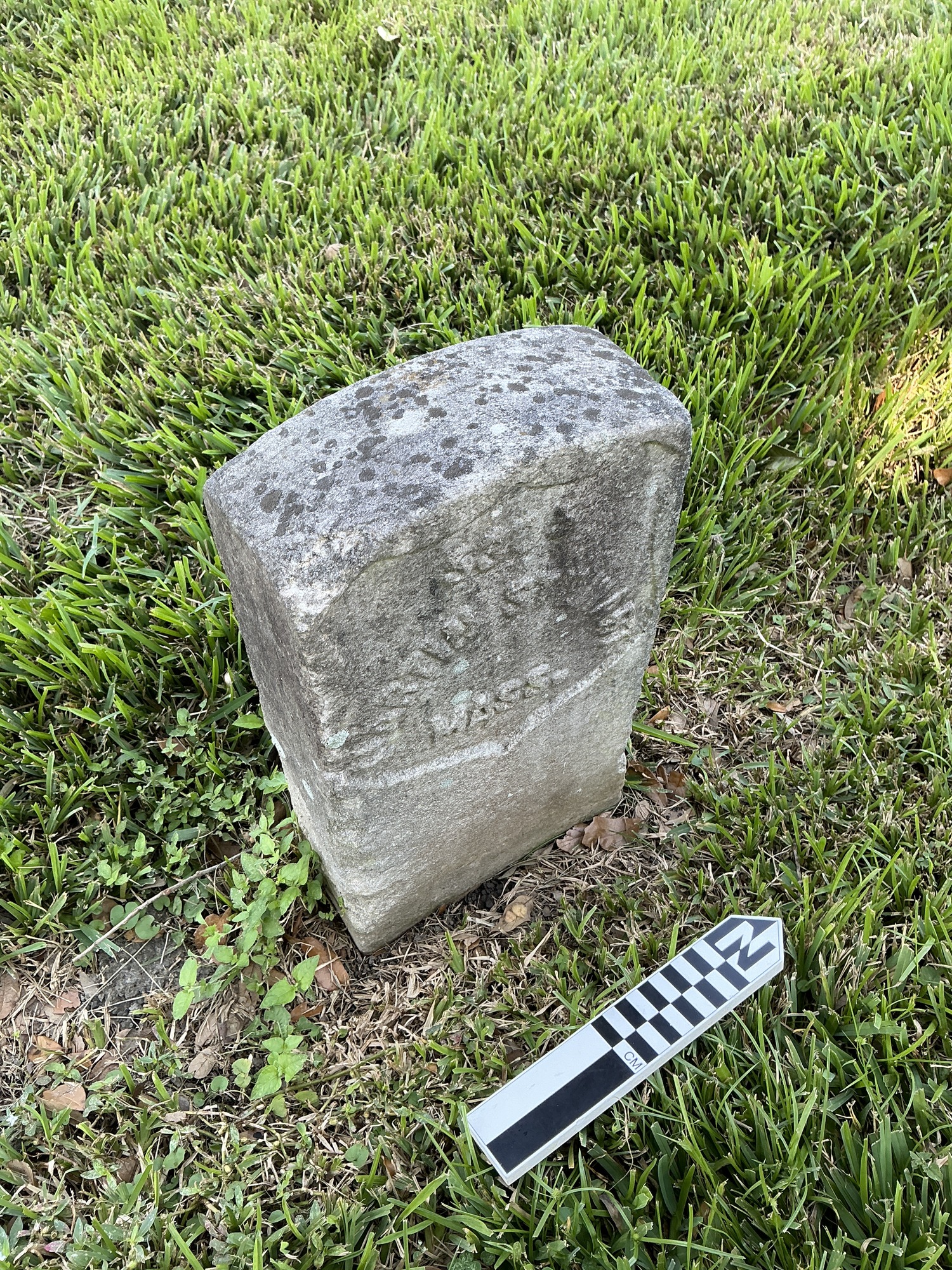 Extra image of historic upright marble headstone with recessed shield face.