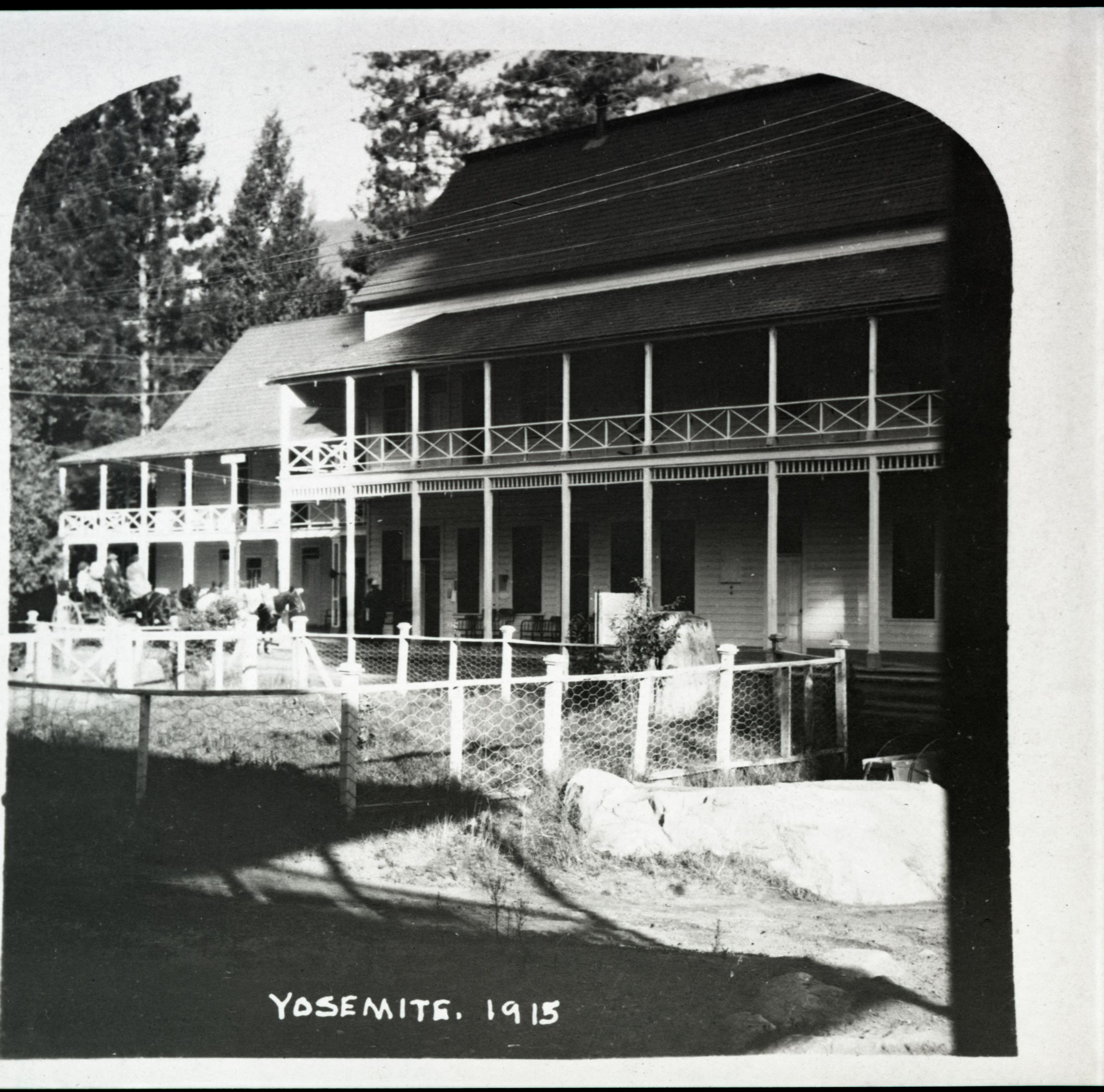 Yosemite, 1915. Sentinel Hotel and River Cottage in old Village.