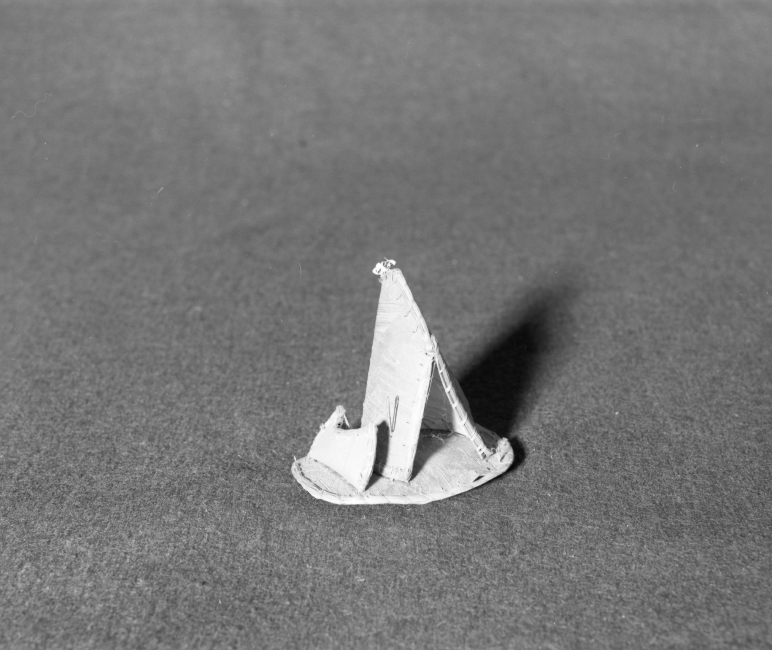 Marie Rozier Collection, Catalog No. 205. Object: Birchbark novelty. Dimensions: 3 1/2 x 3 1/2". Materials: Birchbark, sweetgrass, raffia. Collection History: "Cache Creek, B.C., Canada" imprinted on piece. Purchased in 1969. Photographed by Michael Dixon in December 1982. Catalogued by Craig Bates and Barbara Beroza. Yosemite Collections, National Park Service.