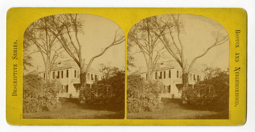 Stereograph of Georgian mansion through trees.