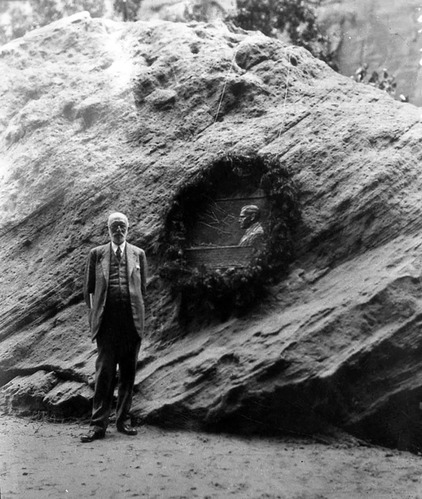 Heber J. Grant, President of the Mormon Church, Zion stadium standing near Mather memorial plaque.