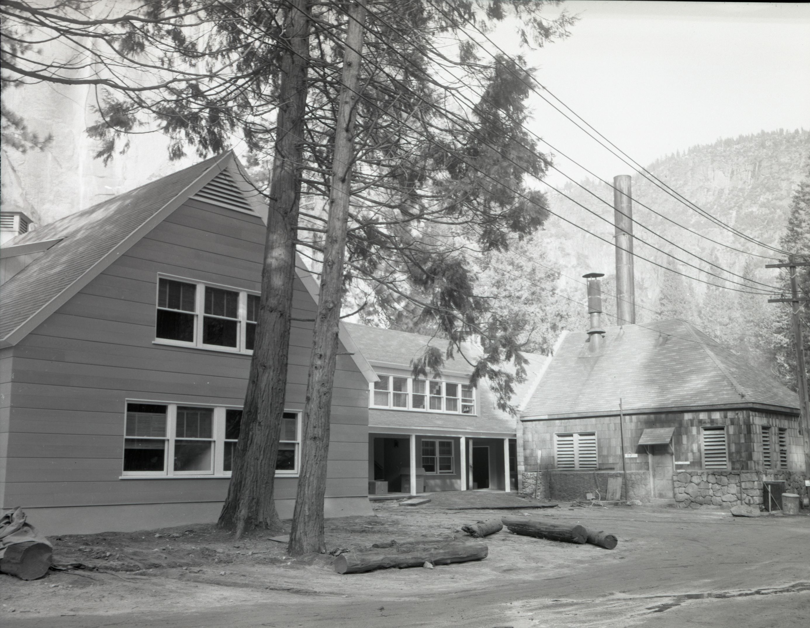 Construction of the New Yosemite Lodge 1955-1956. 7 negatives of December 13, 1955 including Cedar Cottage.