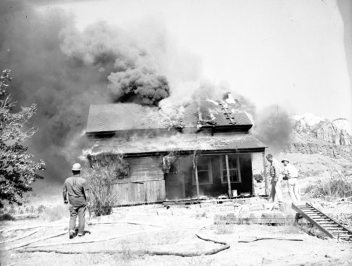 Fire prevention training; demonstration for students of Springdale school. Burning of old Justet home adjacent to Springdale school.
