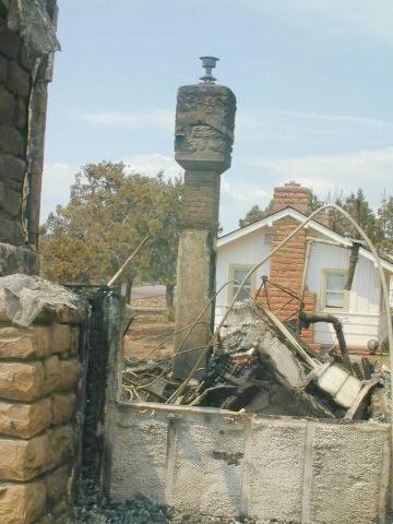 Burned houses following the Long Mesa fire, Mesa Verde National Park, August 2002