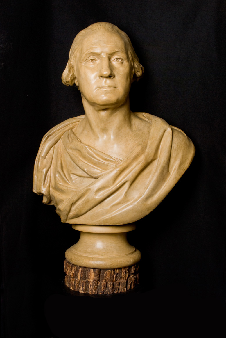 Tan bust of George Washington with classical draping over chest