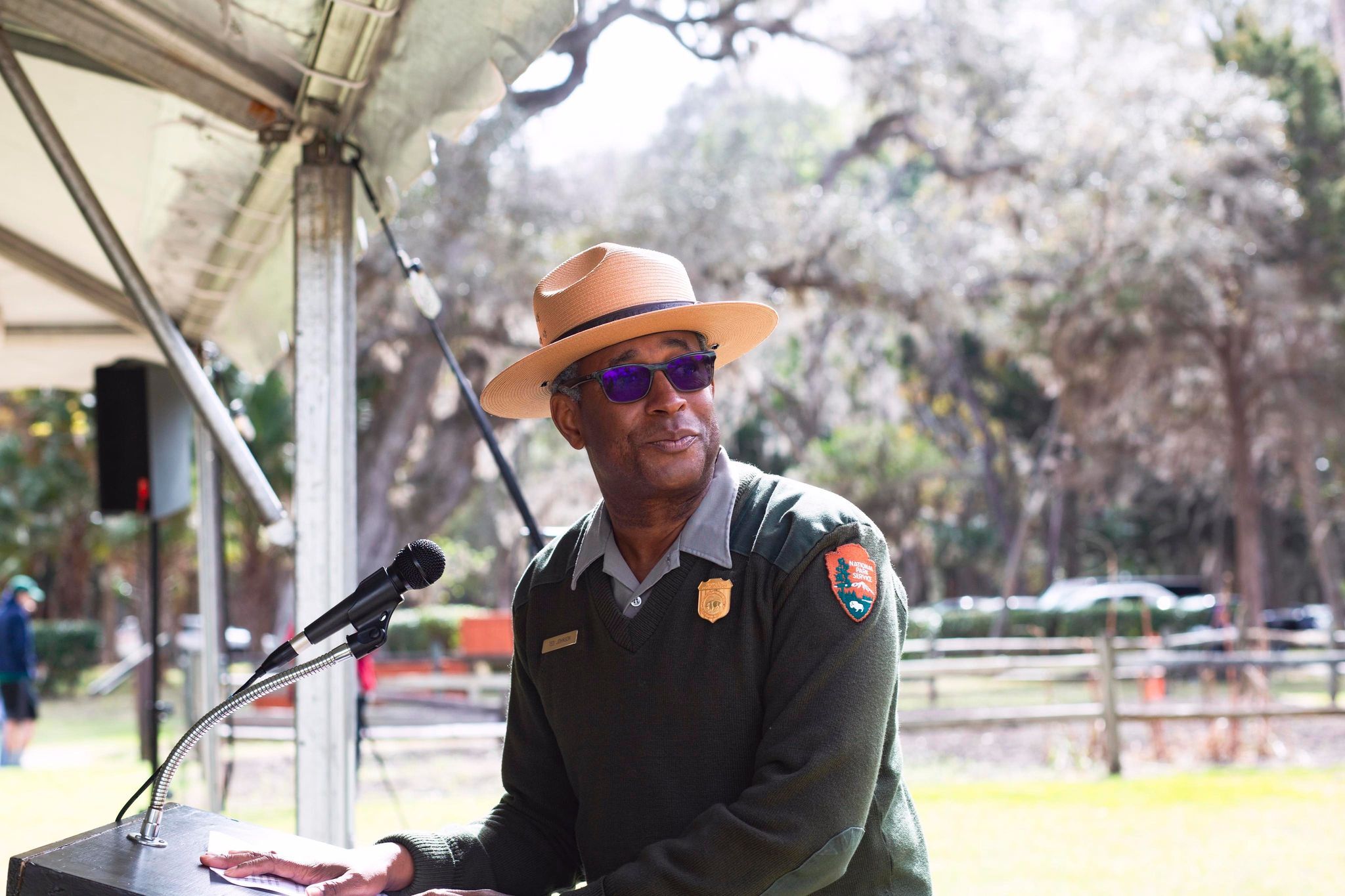 ranger at podium looks off