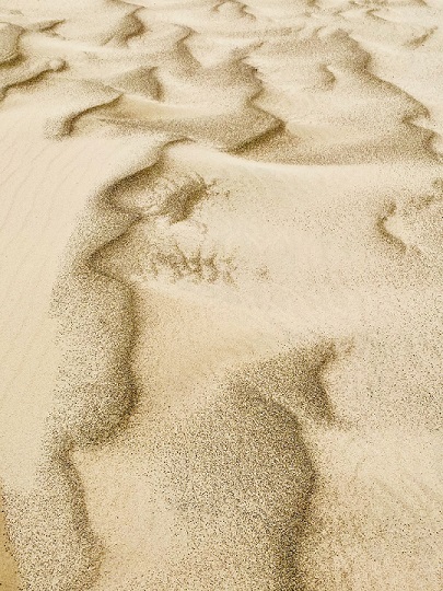 As the lightest grains get lifted away, the heaviest minerals are left behind