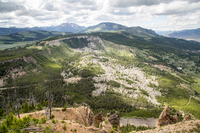 A view looking down on flat topped, Terrace Mountain with jumbled pieces of the old terrace down below it.