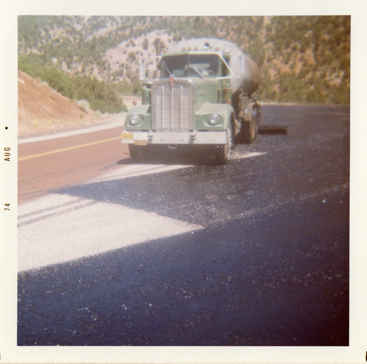 Construction vehicle during chipsealing of Zion roads.