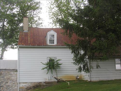 Exterior of the william Roulette Farmhouse in June 2010