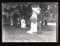 Madeleine Edison and John Eyre Sloane at their wedding on lawn of Glenmont, Thomas Edison and Mina Edison in the background.