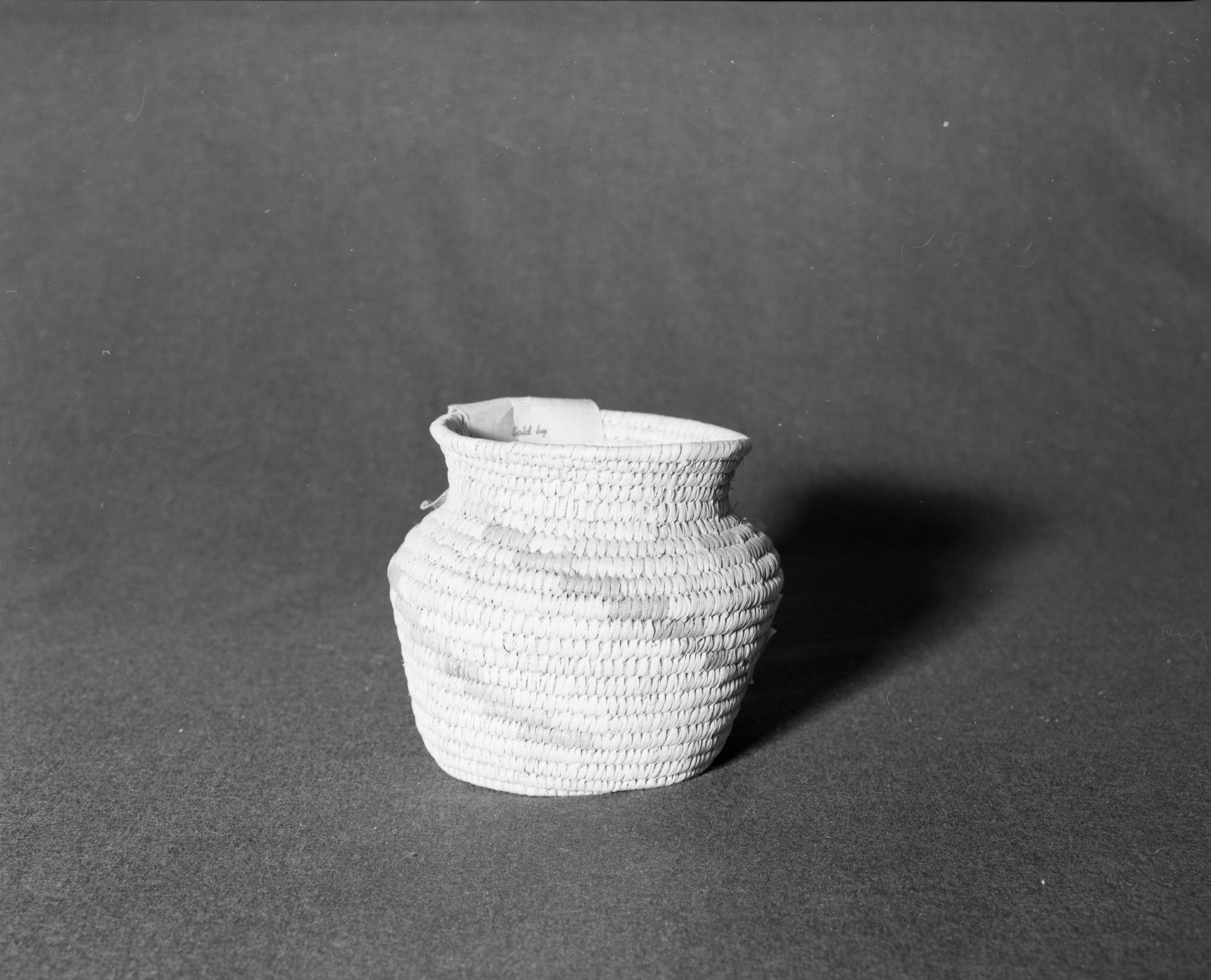 Marie Rozier Collection, Catalog No. 97. Object: Papago basket. Dimensions: 6 x 6". Materials: entirely yucca. Technology: ---. Collection History: sold by Gila Bend Trading Post, Gila Bend, Arizona. Gift of M. Long. Photographed by Michael Dixon, Dec. 1982. Catalogued by Craig Bates and Barbara Beroza. Yosemite Collections, National Park Service.