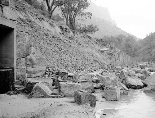 Flood damage to rock wall on Virgin River, a quarter mile south of Court of Patriarchs. Record of damage or defective workmanship.