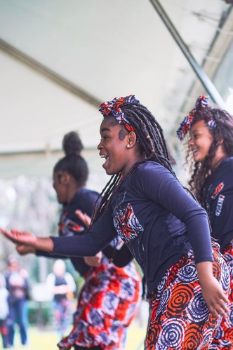young dancer in African inspired dance costume performs
