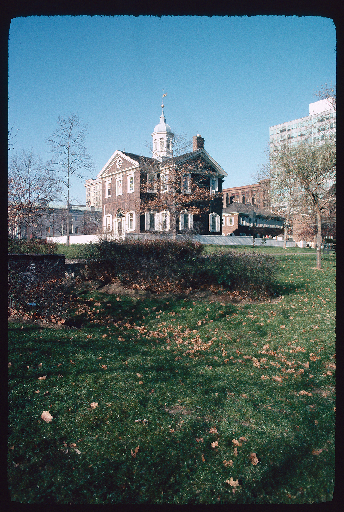Carpenter's Hall. Exterior. South and east sides. Looking northwest across Hudson's Alley from grass near old Dock Creek.