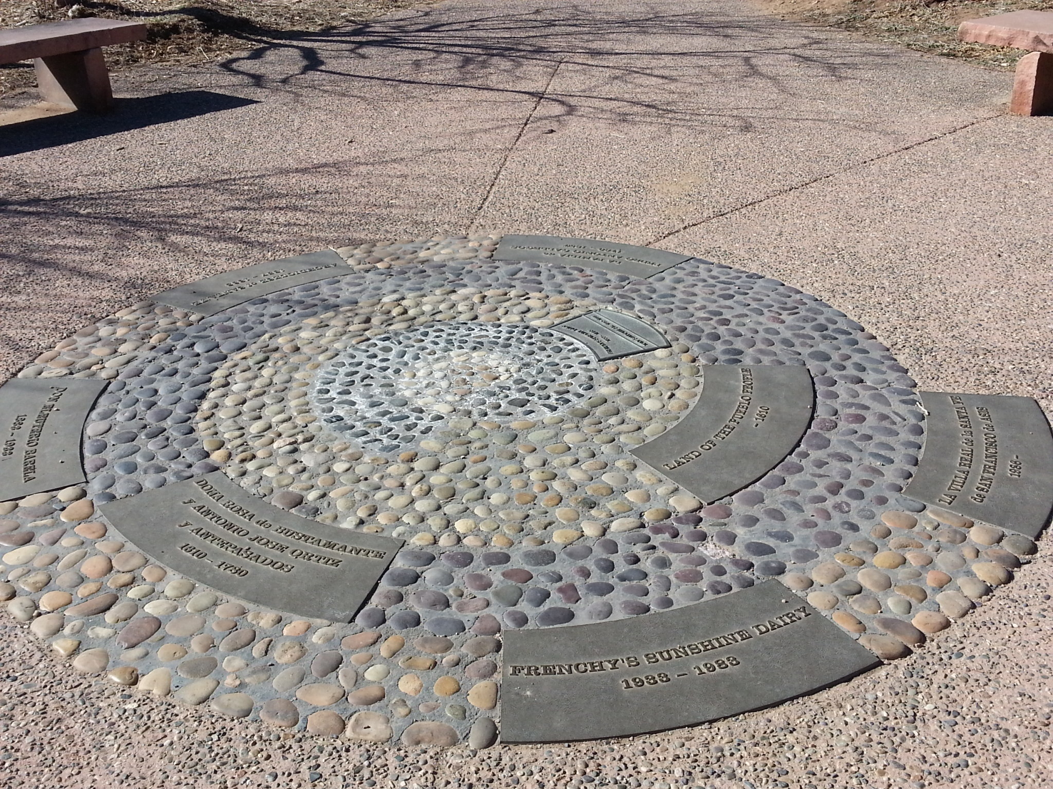 A stone labrynth and rest area at Frenchy's Field Park in Santa Fe, NM