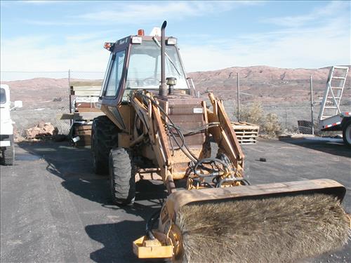 Case 580 4x4 loader/broom/mower