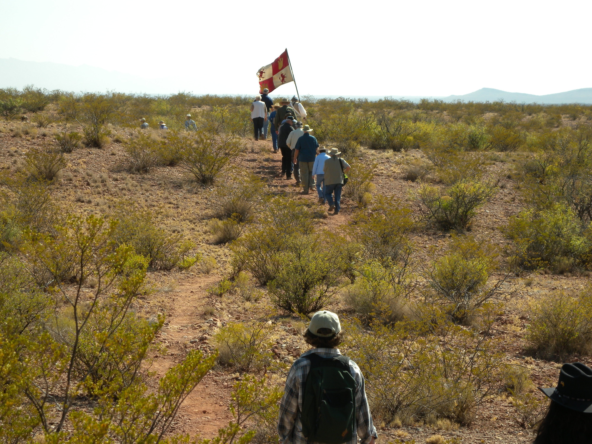 A group takes part in a Spanish reenactment march at the Yost Draw in the Jornada del Muerto Trail in Sierra County, NM