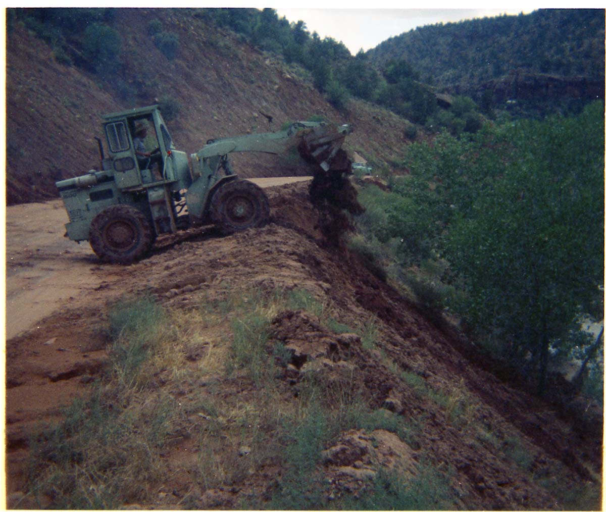 Color photos of flood damage from the flood of 1975.