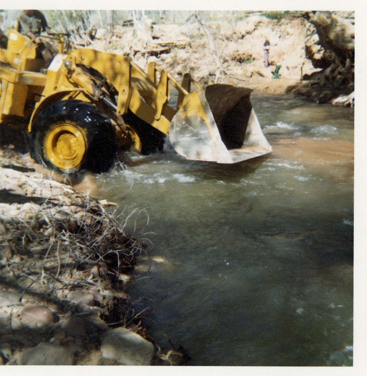 Color photos of channel clearing and bank stabilization along the Virgin River near Birch Creek.