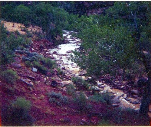 Color photos of flood damage from the flood of 1975.