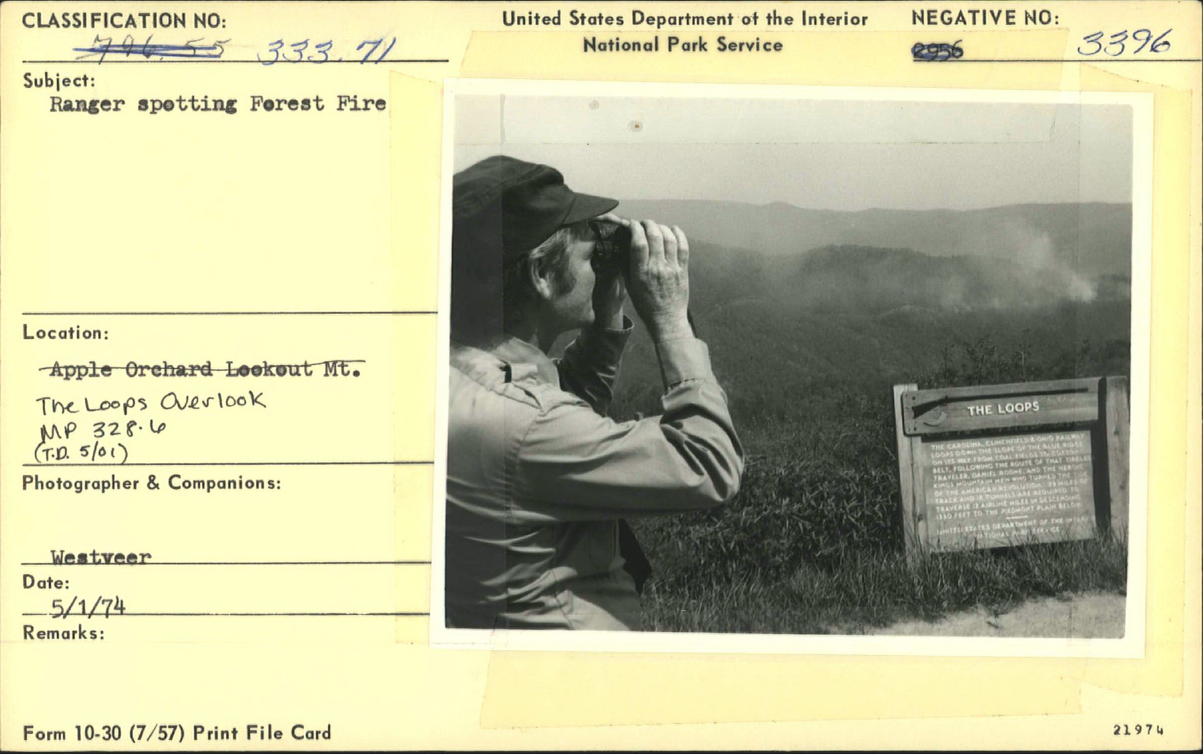 Ranger spotting forest fire from The Loops Overlook