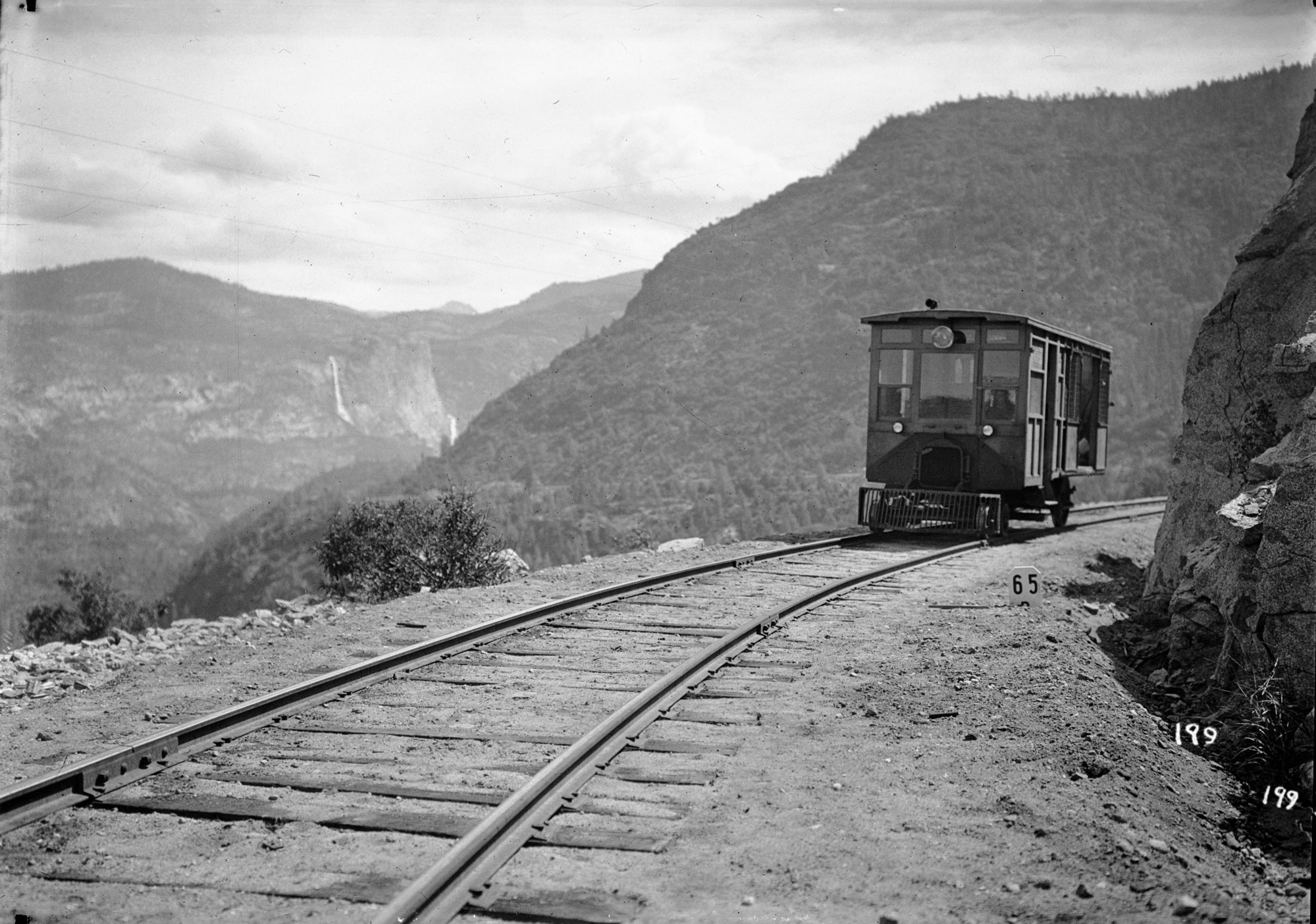 Copy Neg: Leroy Radanovich, December 2001. Gasoline rail car (vintage, unknown). Hetch Hetchy in background.