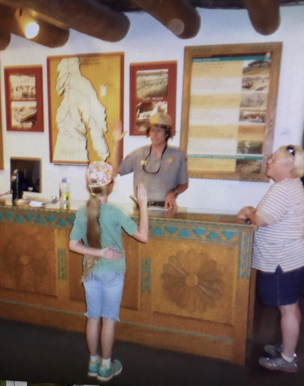 Makenna as a young girl, swearing in as a Junior Ranger at Mesa Verde National Park.