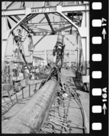 C.A. Thayer (built 1895; schooner, 3m) Mast Replacement, 1983-1984. Various views of the vessel and heavy equipment during the mast replacement, 1983-1984.
