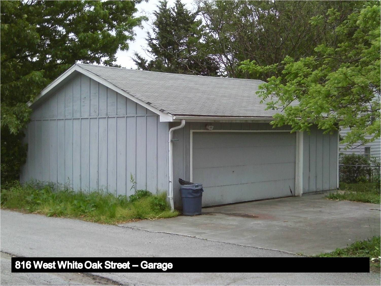 Image of a garage with a gabled roof.