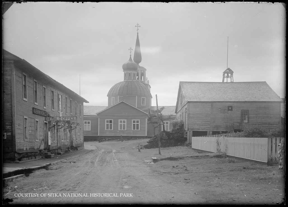 Alaskan Herald office; St. Michael's Cathedral and Fire Hall.