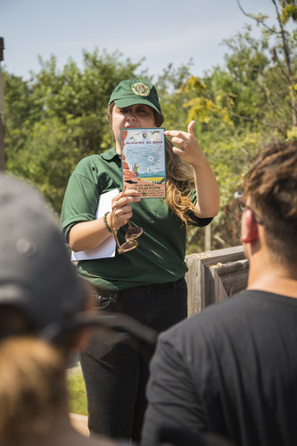 Photo of park ranger with solar eclipse glasses