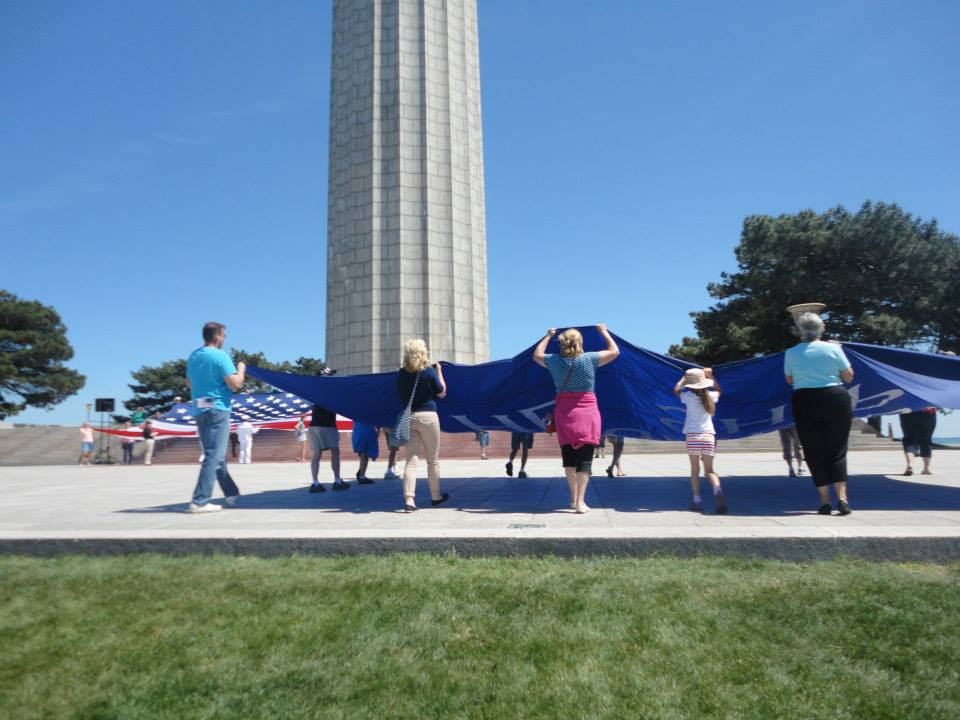 Volunteers with DGUTS Flag
