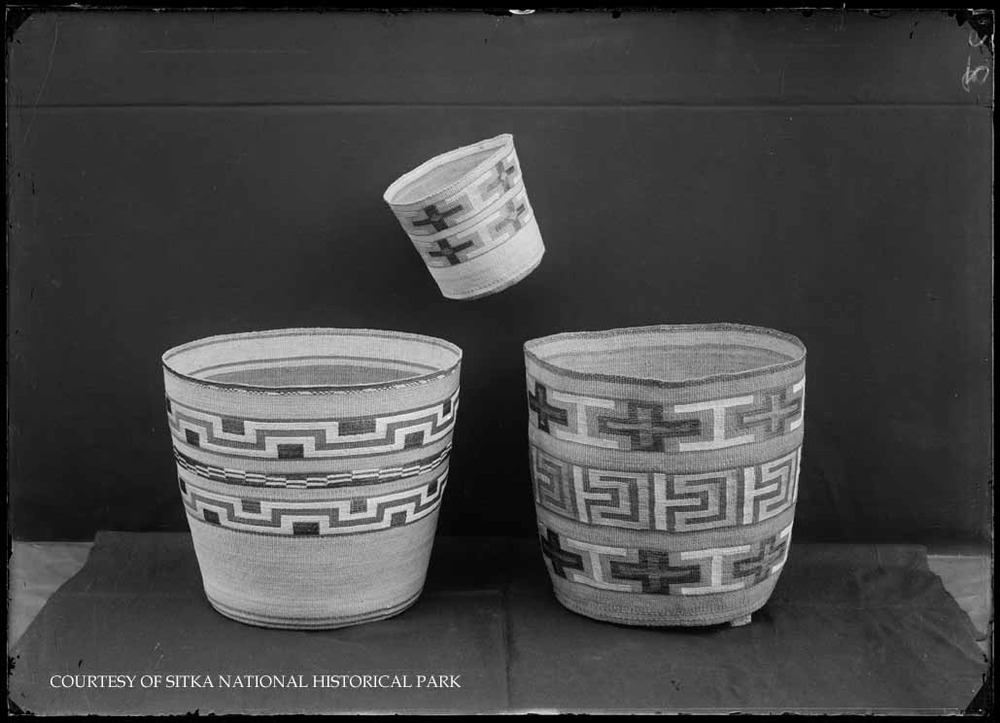 Multiple spruce root baskets arranged in rows.