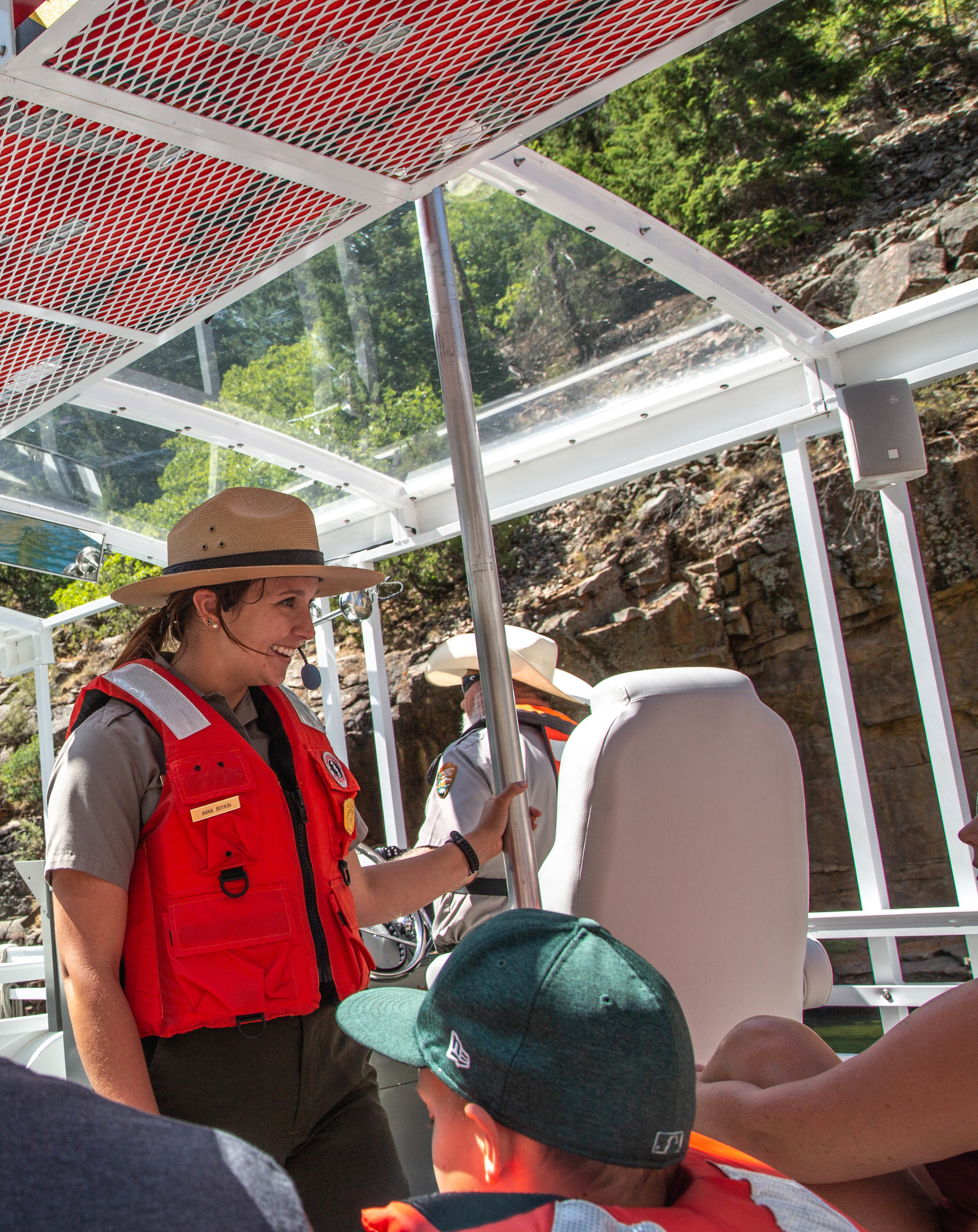 Ranger giving a tour on a boat