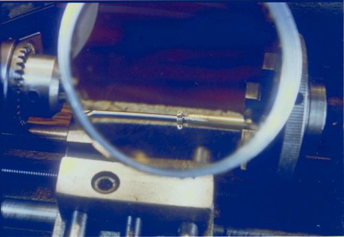 Making a mast band for the model of Kathleen (built 1901; spritsail barge), circa 1968-1969