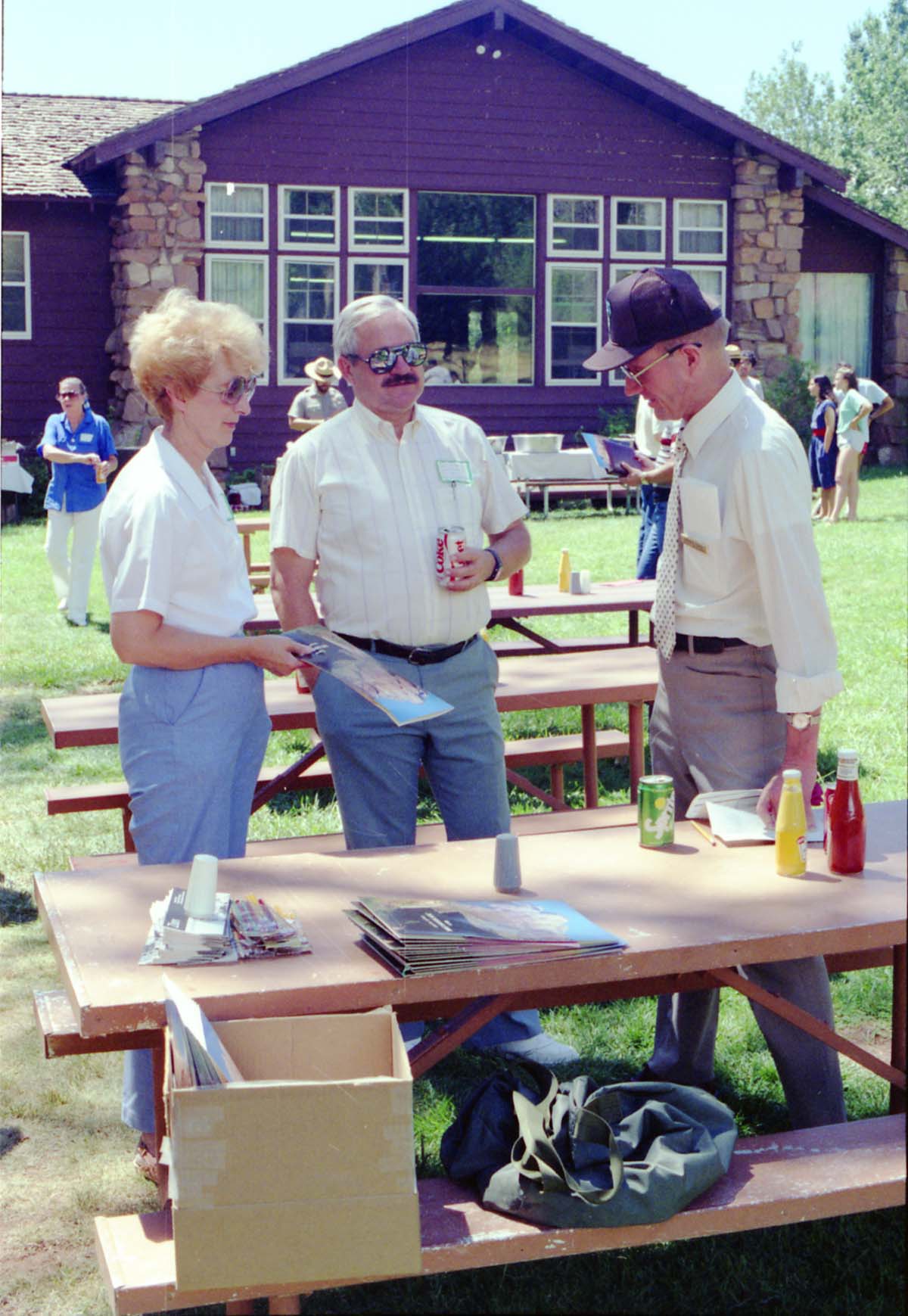 Color Photos of the parks 72nd anniversary celebrations- cake cutting, barbecue, speakers.