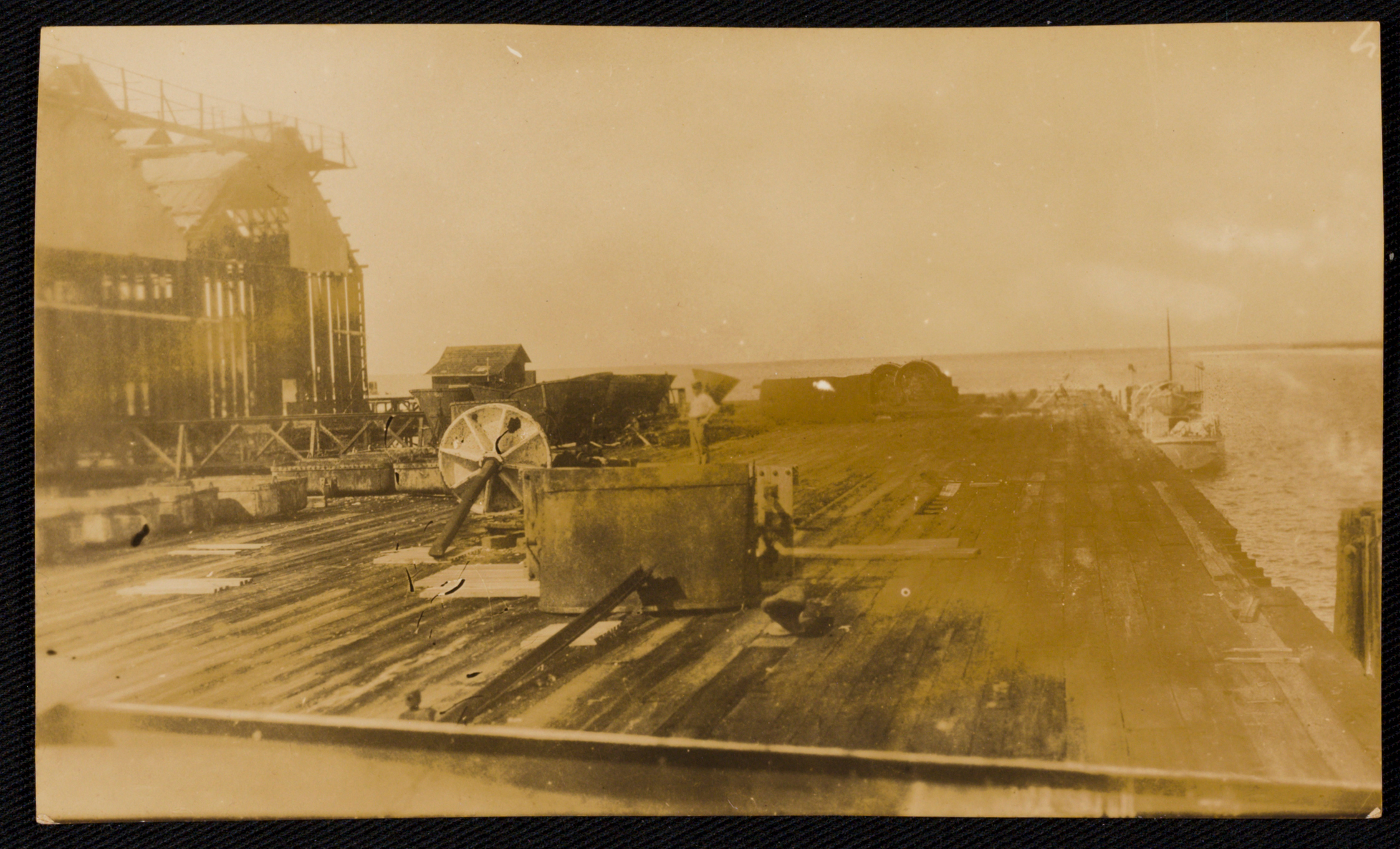 Full view of damaged coal conveyors at the South Pier of Fort Jefferson. 