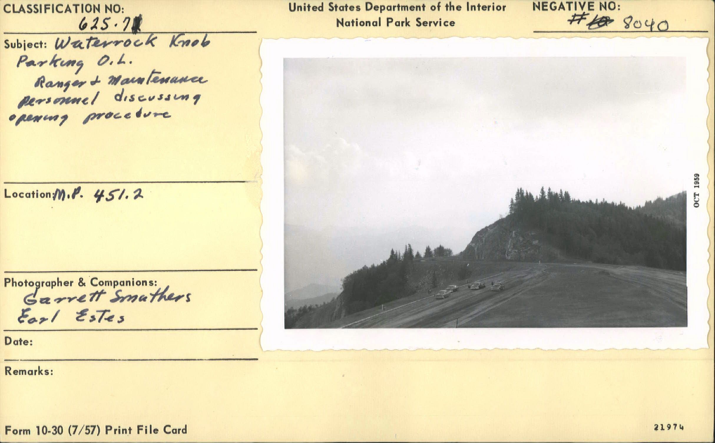 Maintenance staff discussing parking procedure at Waterrock Knob Parking Overlook