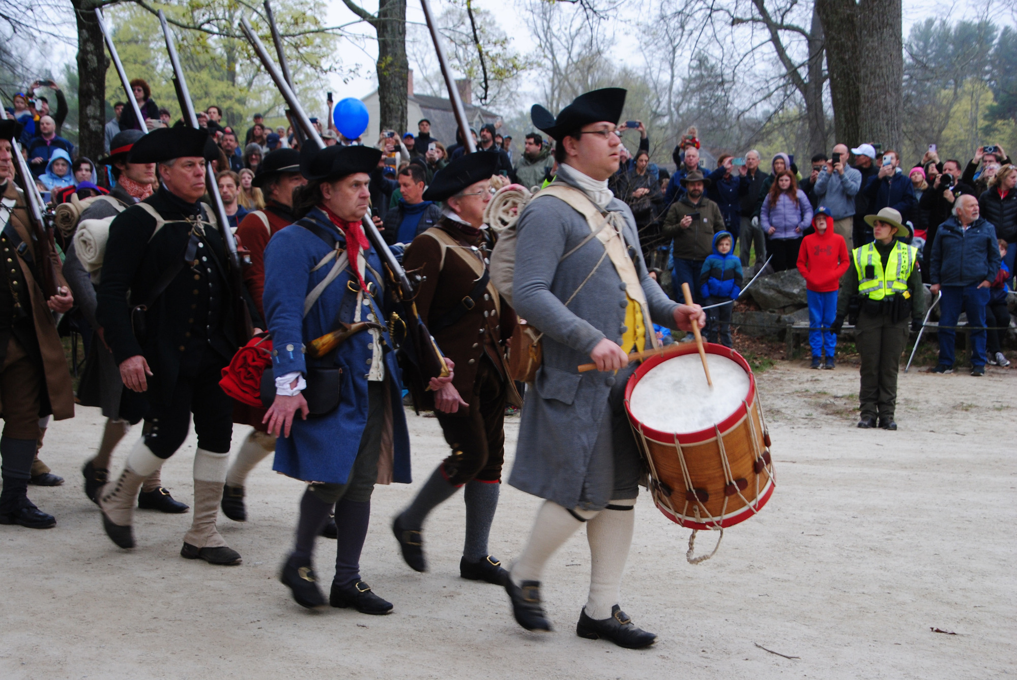Company of minute men marching towards the North Bridge 