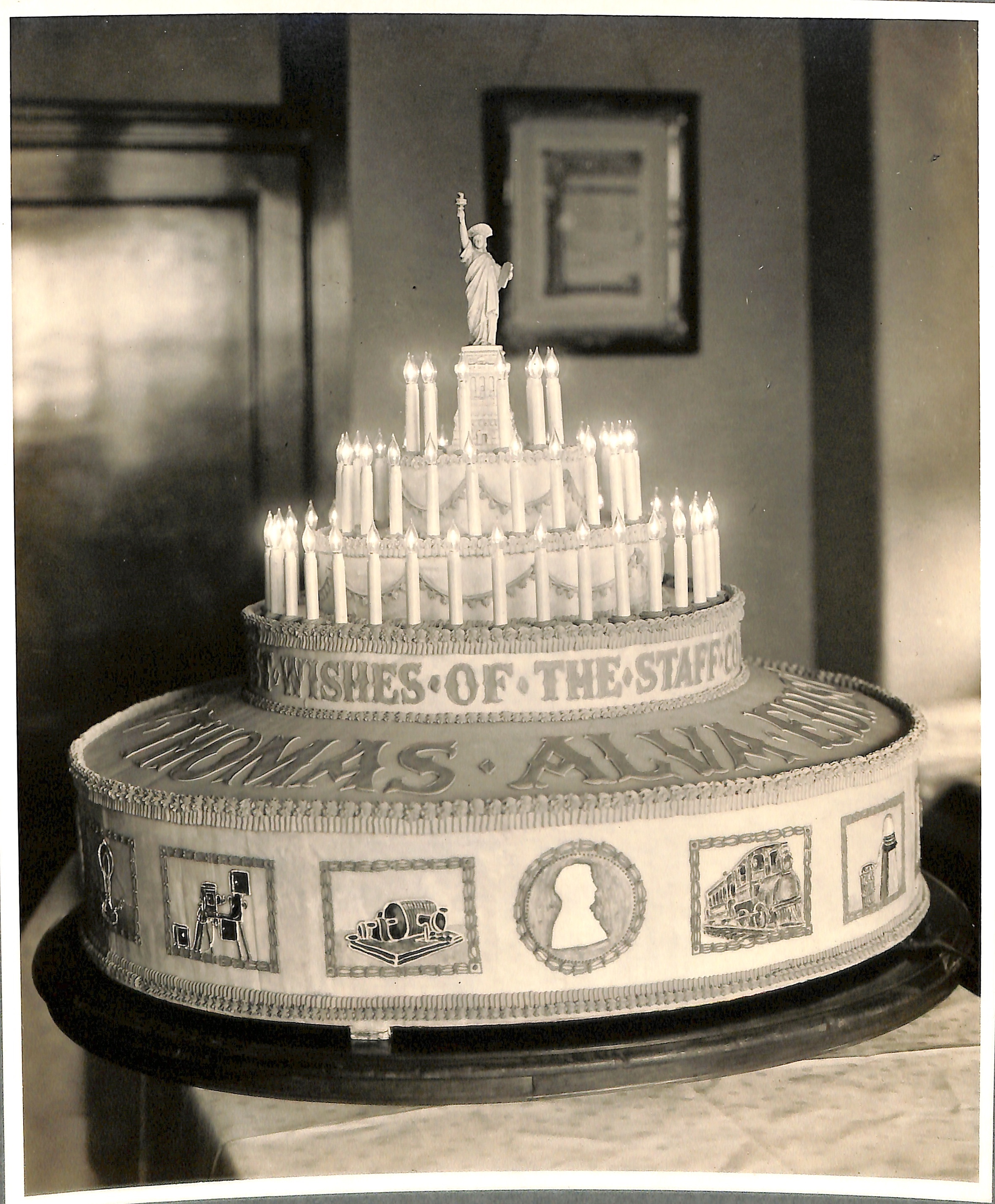 Edison birthday cake presented to Thomas Edison by staff council of Edison Co. on his seventieth birthday.