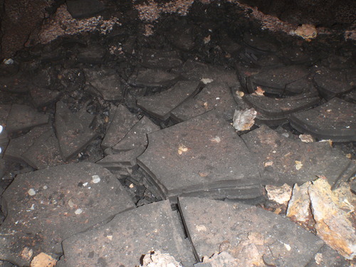 Broken sections of black manganese deposits