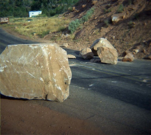 Color Photo of a rock slide near the junction of routes 1 and 2.